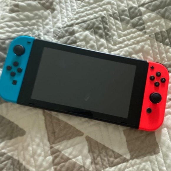 Nintendo Switch™ with Neon Blue and Neon Red Joy‑Con™ - Picture 3 of 7